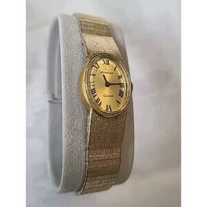 Vintage women's Wittnauer Geneve watch dainty oval face gold tone (engraved)
